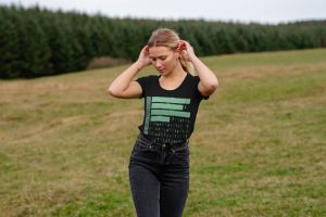 T-shirt from Gaia's Threads featuring a design depicting trees and deforestation.