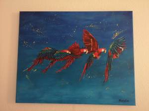 Finished Macaw painting symbolizing transformation.